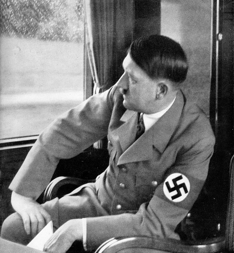 Adolf Hitler in the train between Berchtesgaden and Nuremberg on his way to the Parteitag der Ehre